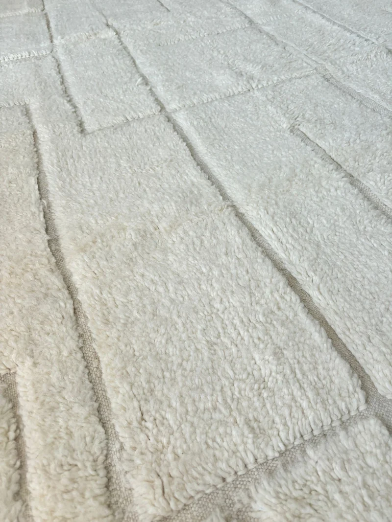 Tapis crème abstrait