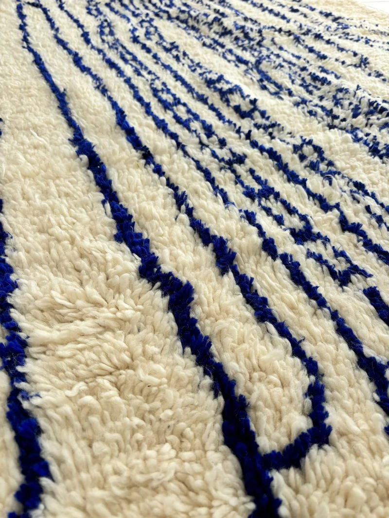Tapis beige / bleu roi