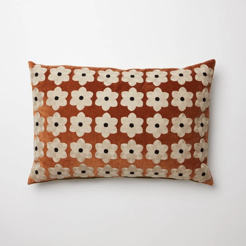 Coussin fleurs rouille